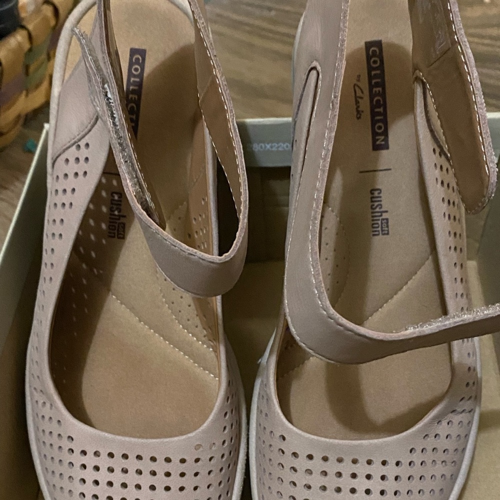 Clark sandals. Very comfortable. Use them 2 or 3 times.